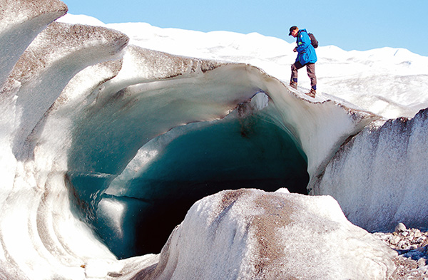 The meltwater from the inland ice forms tunnels in the ice